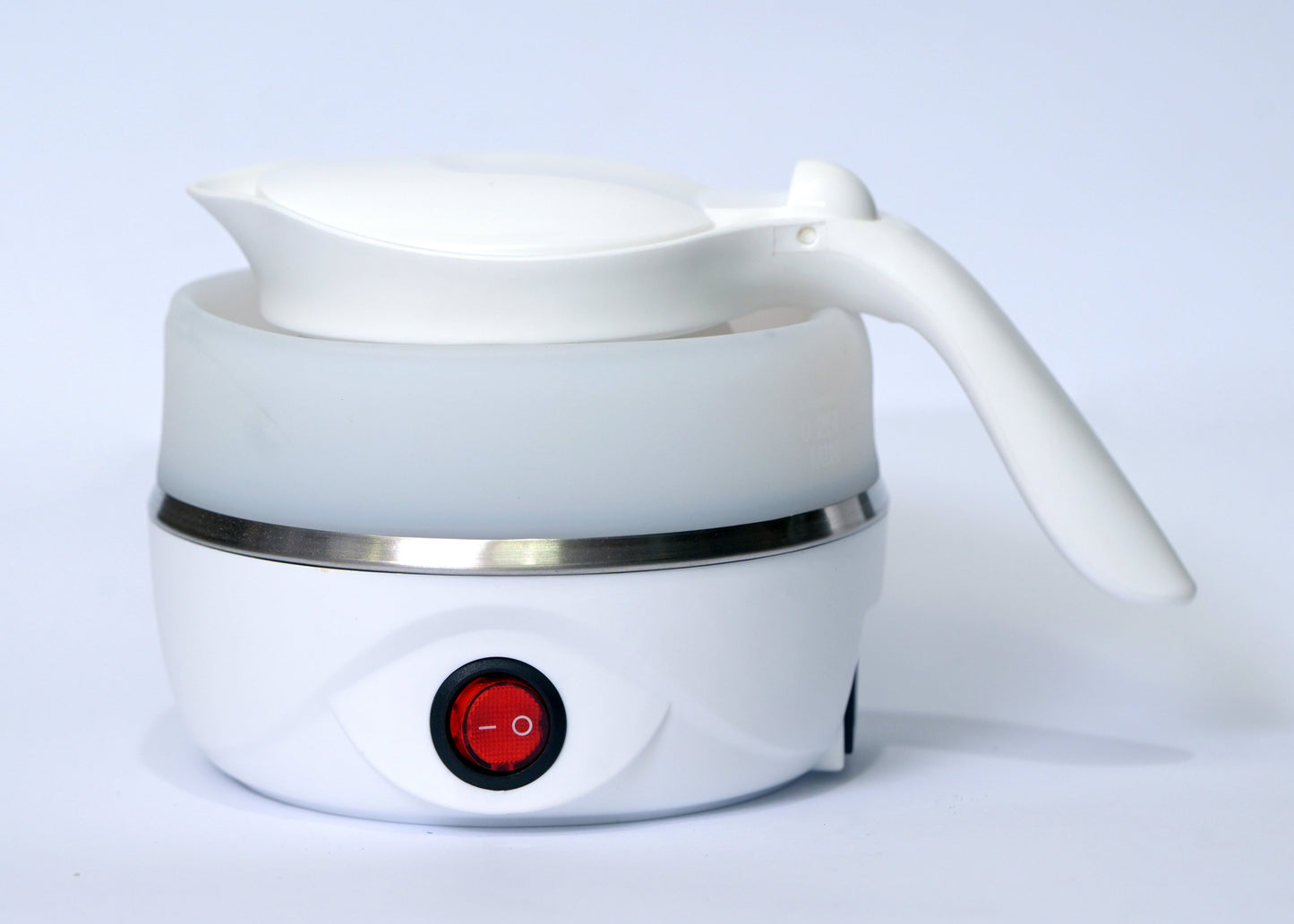 White electric kettle with a red light